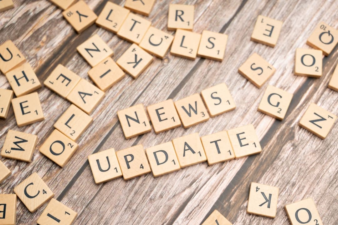 documentation fraud. Scrabble tiles spelling news update on a wooden table