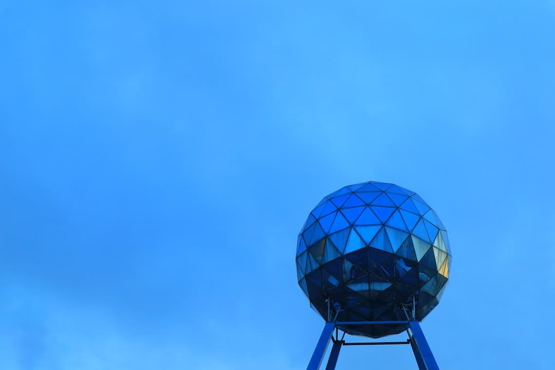 support animal damage — a blue water tower with a blue sky in the background