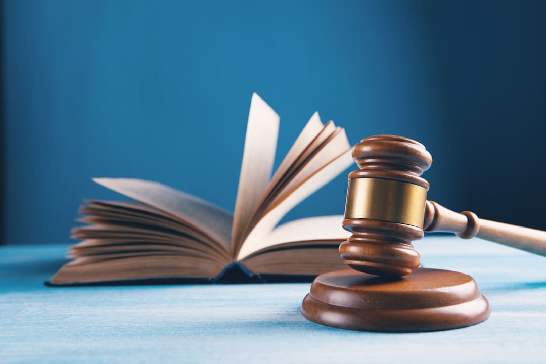 support animal fraud laws — judges gavel and open book on table
