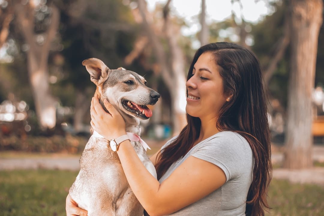 panic disorder support — woman playing with dog